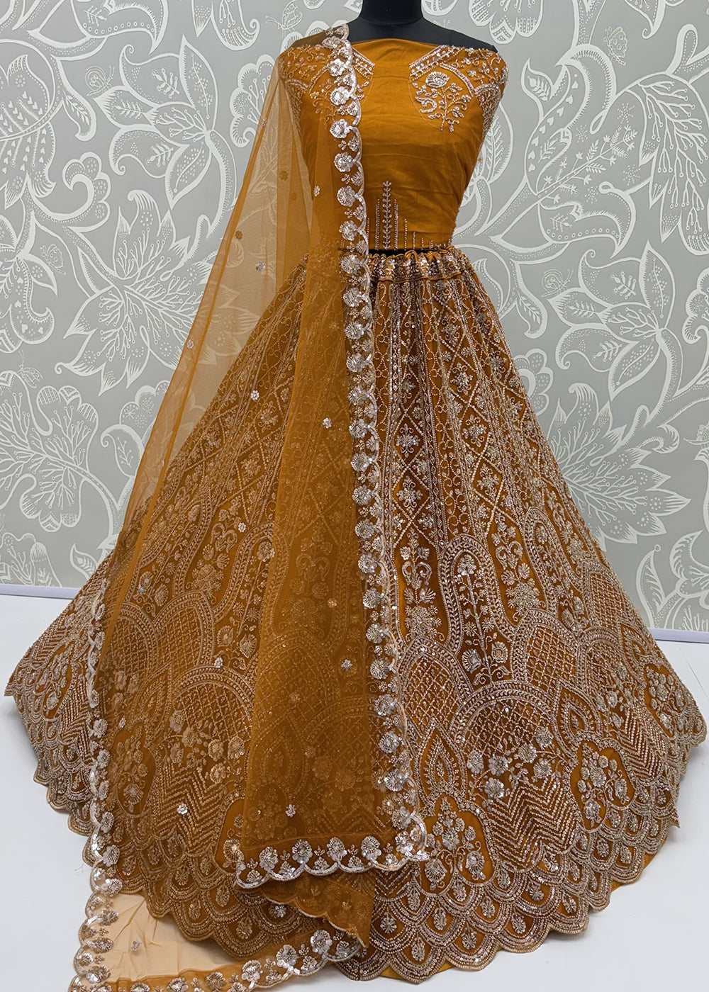 Shop Now Amazing Rust Designed Wedding Wear Lehenga Choli Online in USA, UK, Canada, France, Germany, Austria, Australia, Italy, Denmark &amp; Worldwide at Empress.