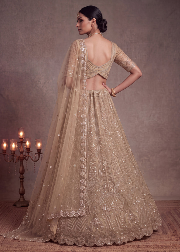 Shop Now Amazing Chiku Designed Wedding Wear Lehenga Choli Online in US, UK, Canada, France, Germany, Austria, Australia, Italy, Denmark &amp; Worldwide at Empress.