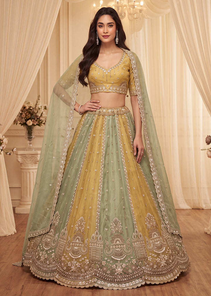 Shop Now Pastel Mustard &amp; Green Embroidered Silk Wedding Lehenga choli Online in US, UK, Canada, France, Germany, Austria, Australia, UAE &amp; Worldwide at Empress.