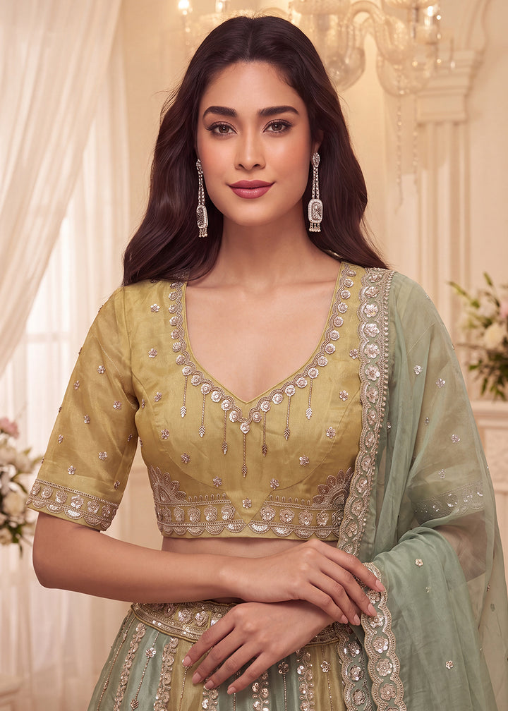 Shop Now Pastel Mustard &amp; Green Embroidered Silk Wedding Lehenga choli Online in US, UK, Canada, France, Germany, Austria, Australia, UAE &amp; Worldwide at Empress.