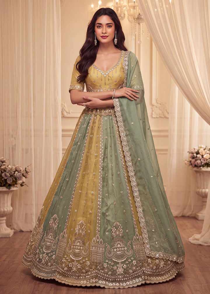 Shop Now Pastel Mustard &amp; Green Embroidered Silk Wedding Lehenga choli Online in US, UK, Canada, France, Germany, Austria, Australia, UAE &amp; Worldwide at Empress.