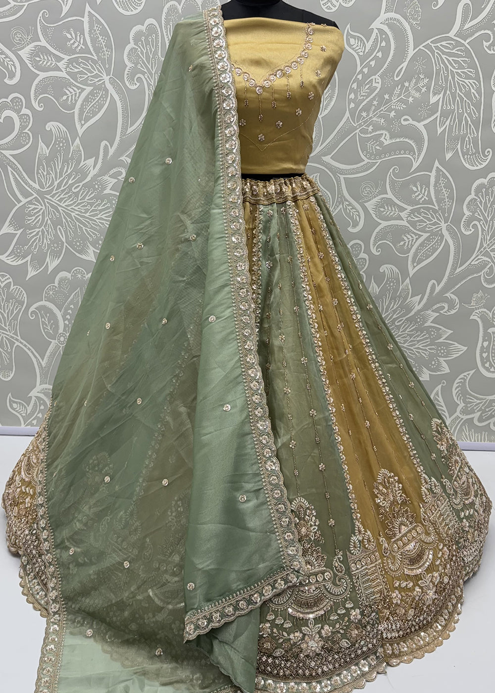 Shop Now Pastel Mustard &amp; Green Embroidered Silk Wedding Lehenga choli Online in US, UK, Canada, France, Germany, Austria, Australia, UAE &amp; Worldwide at Empress.