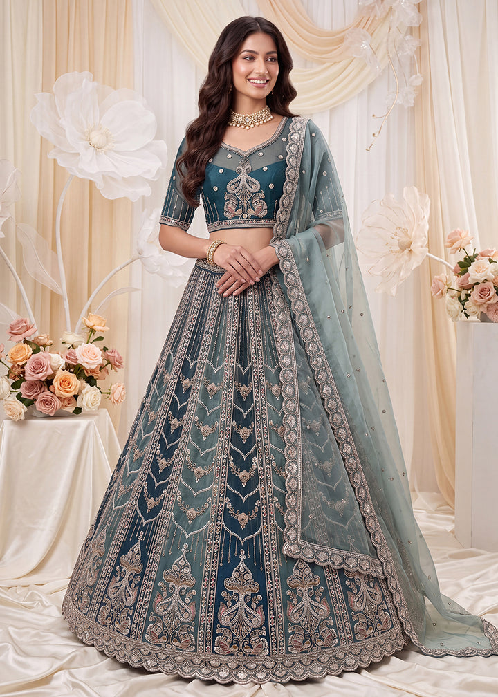 Shop Now Fascinating Shaded Blue Silk Wedding Party Lehenga Choli Online in USA, UK, Canada, France, Germany, Spain, Austria, Australia &amp; Worldwide at Empress.