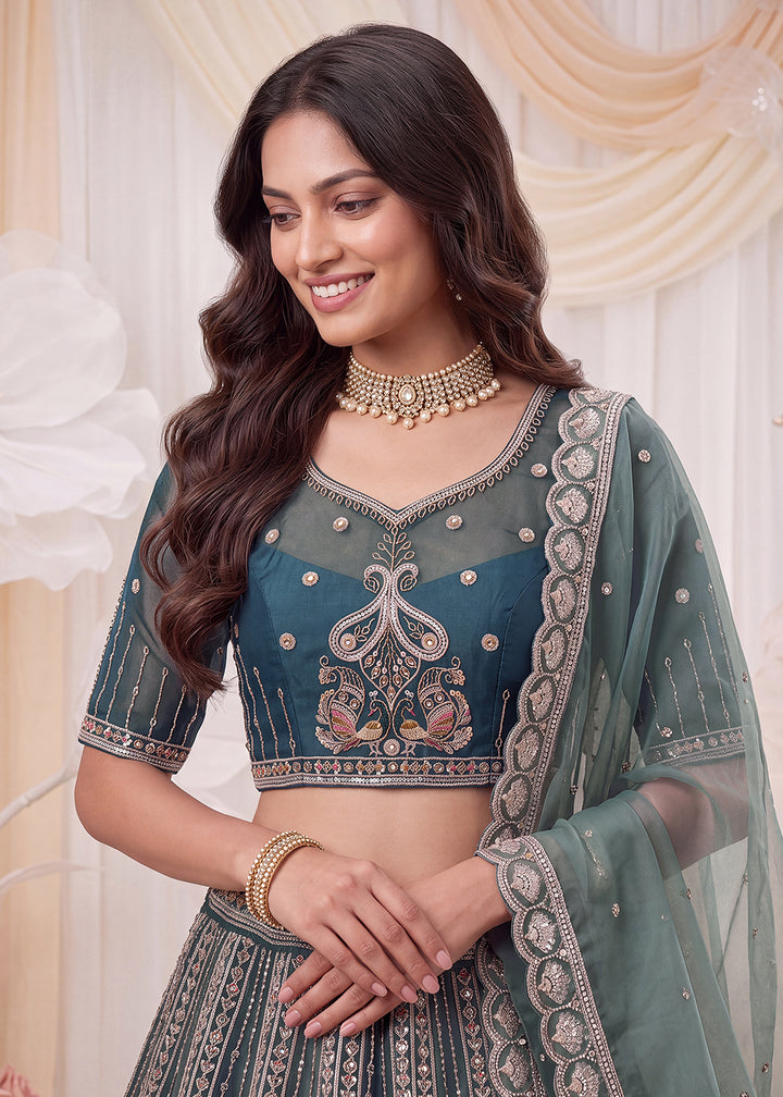 Shop Now Fascinating Shaded Blue Silk Wedding Party Lehenga Choli Online in USA, UK, Canada, France, Germany, Spain, Austria, Australia &amp; Worldwide at Empress.