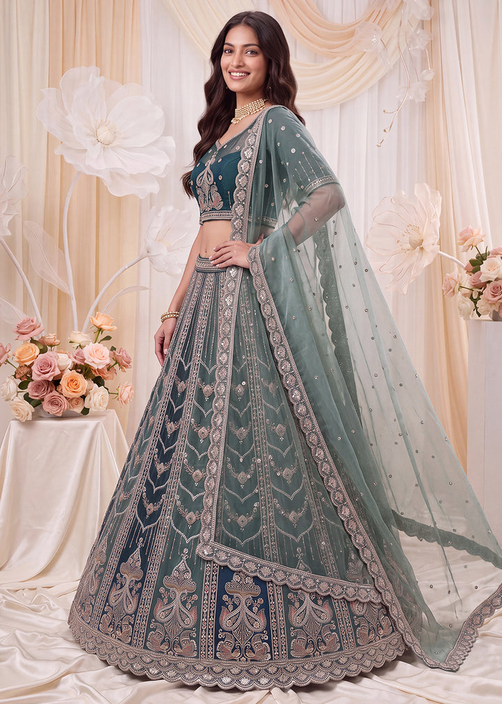 Shop Now Fascinating Shaded Blue Silk Wedding Party Lehenga Choli Online in USA, UK, Canada, France, Germany, Spain, Austria, Australia &amp; Worldwide at Empress.