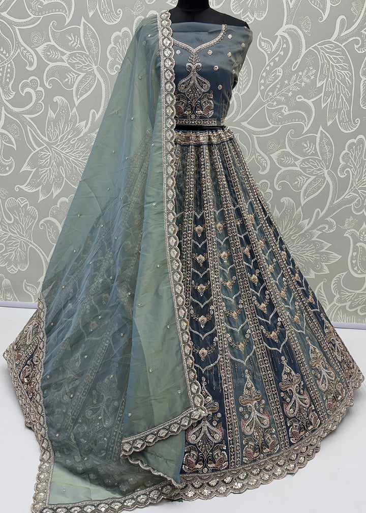Shop Now Fascinating Shaded Blue Silk Wedding Party Lehenga Choli Online in USA, UK, Canada, France, Germany, Spain, Austria, Australia &amp; Worldwide at Empress.