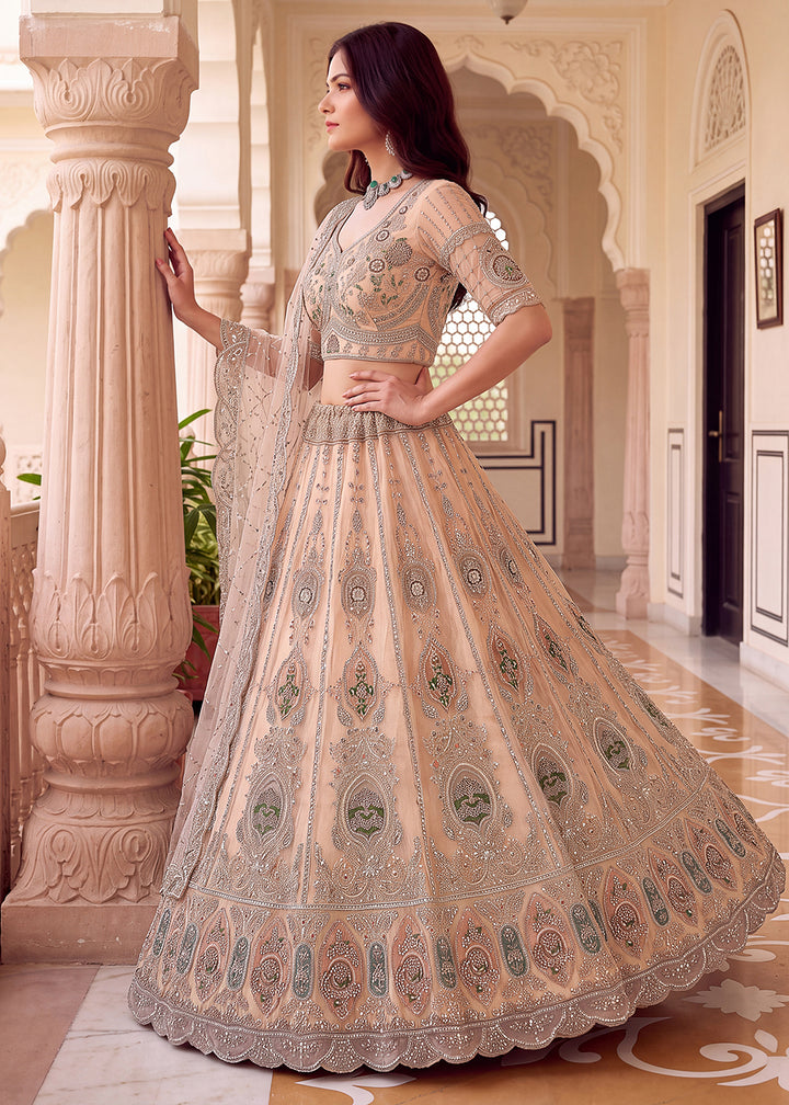 Shop Now Peach Amazing Designed Embroidery Wedding Lehenga Choli Online in USA, UK, Canada, France, Germany, Spain, Austria, Australia &amp; Worldwide at Empress.