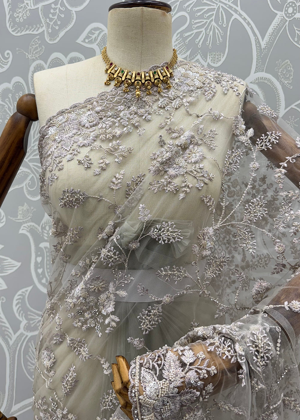 Buy Now Beige Elegant Floral Thread Embroidery Indian Wedding Saree Online in US, UK, Canada, France, Germany, Denmark, Sweden, Austria &amp; Worldwide at Empress.