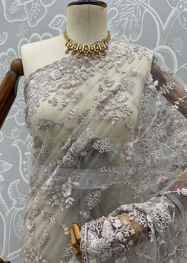 Buy Now Beige Elegant Floral Thread Embroidery Indian Wedding Saree Online in US, UK, Canada, France, Germany, Denmark, Sweden, Austria &amp; Worldwide at Empress.