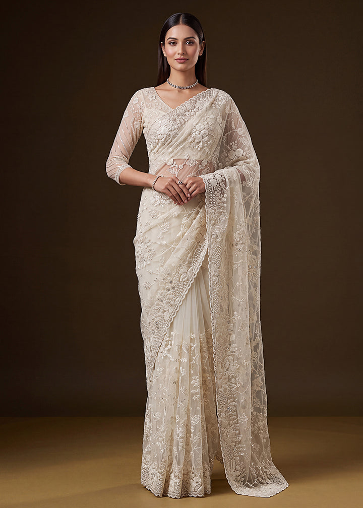 Buy Now Cream Elegant Floral Thread Embroidery Indian Wedding Saree Online in US, UK, Canada, France, Germany, Denmark, Sweden, Austria &amp; Worldwide at Empress.