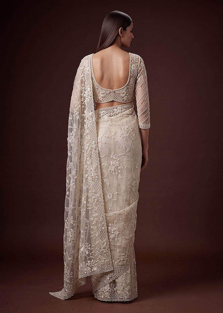 Buy Now Cream Elegant Floral Thread Embroidery Indian Wedding Saree Online in US, UK, Canada, France, Germany, Denmark, Sweden, Austria &amp; Worldwide at Empress.