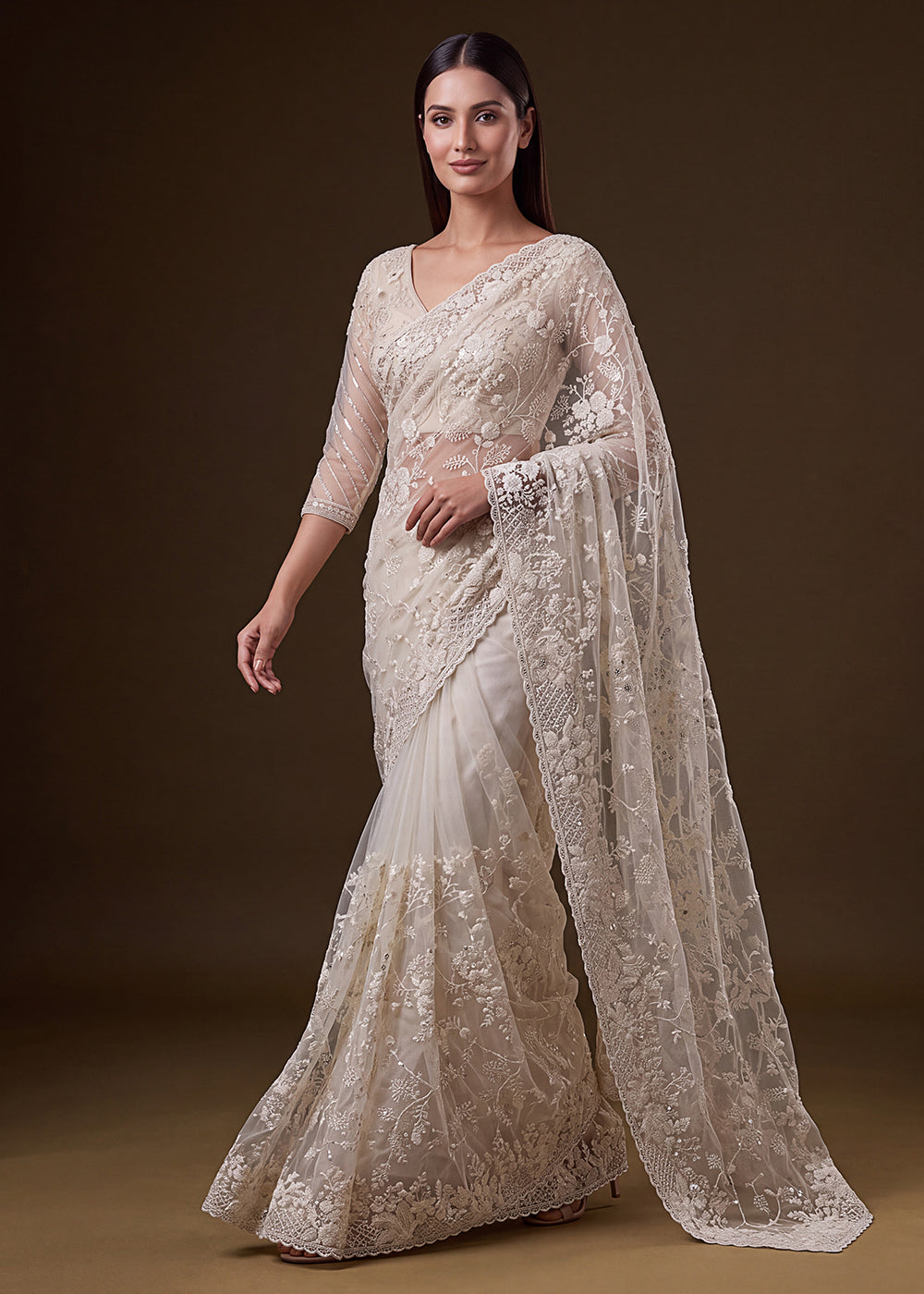 Buy Now Cream Elegant Floral Thread Embroidery Indian Wedding Saree Online in US, UK, Canada, France, Germany, Denmark, Sweden, Austria &amp; Worldwide at Empress.