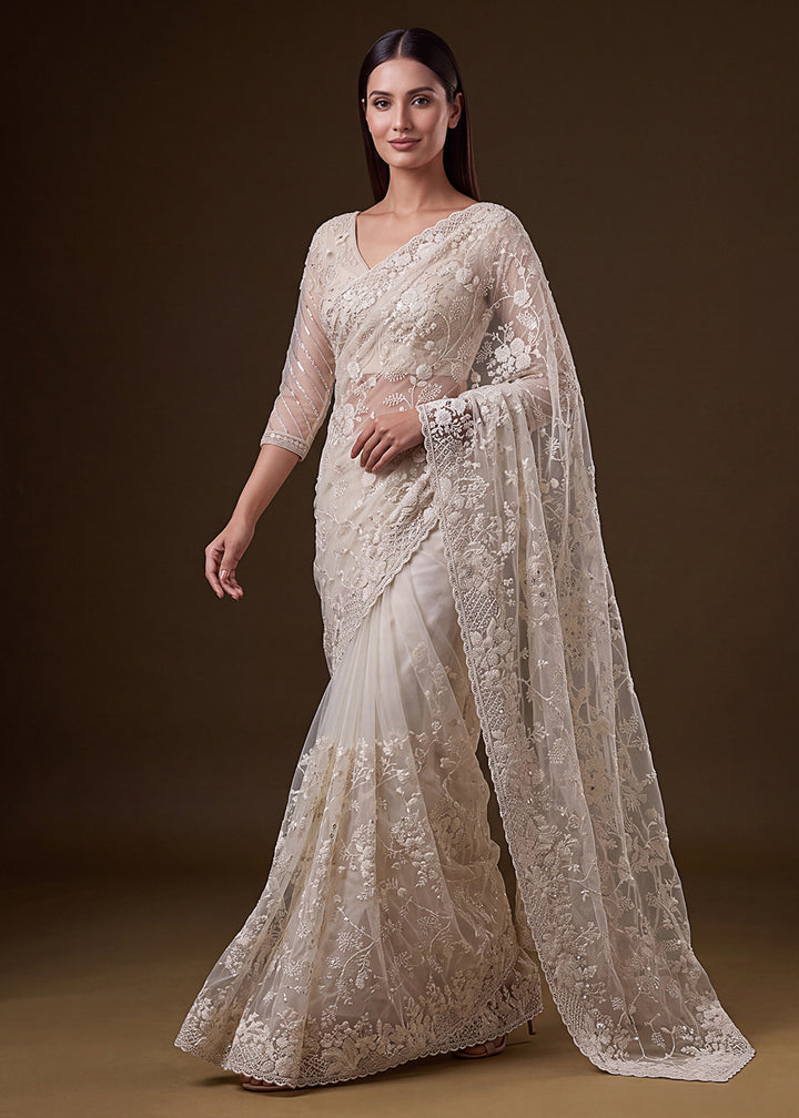 Buy Now Cream Elegant Floral Thread Embroidery Indian Wedding Saree Online in US, UK, Canada, France, Germany, Denmark, Sweden, Austria &amp; Worldwide at Empress.