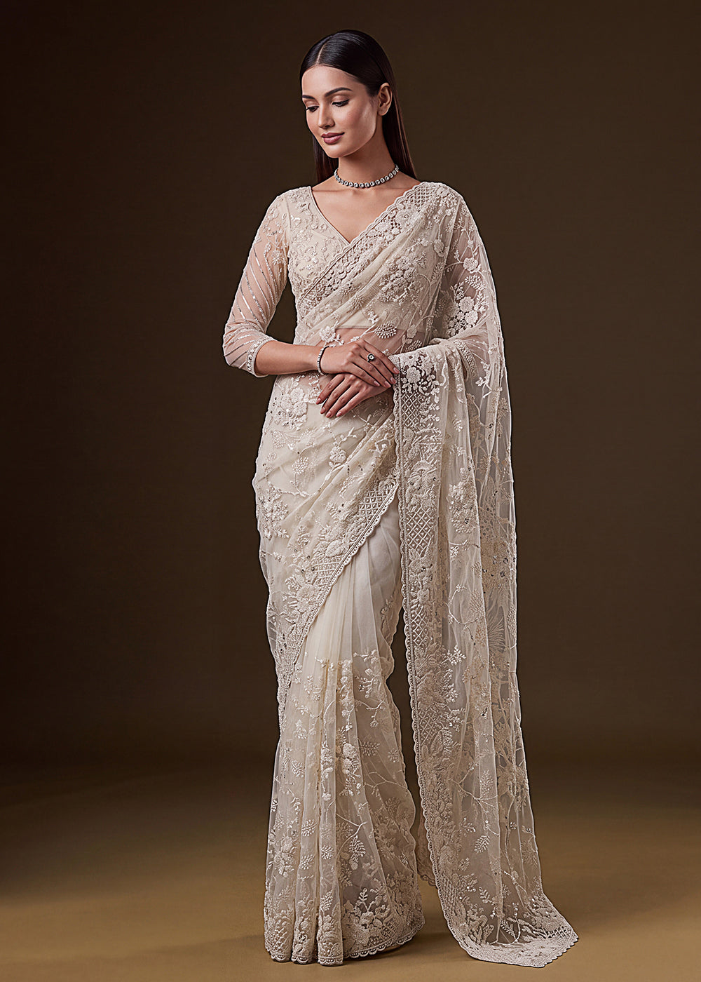 Buy Now Cream Elegant Floral Thread Embroidery Indian Wedding Saree Online in US, UK, Canada, France, Germany, Denmark, Sweden, Austria &amp; Worldwide at Empress.