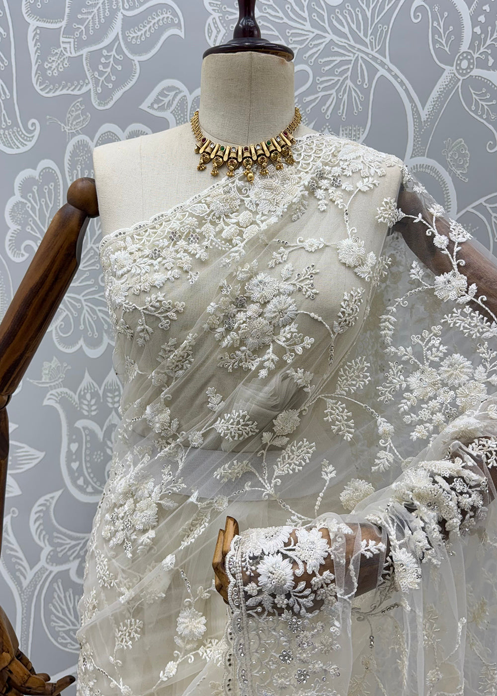 Buy Now Cream Elegant Floral Thread Embroidery Indian Wedding Saree Online in US, UK, Canada, France, Germany, Denmark, Sweden, Austria &amp; Worldwide at Empress.