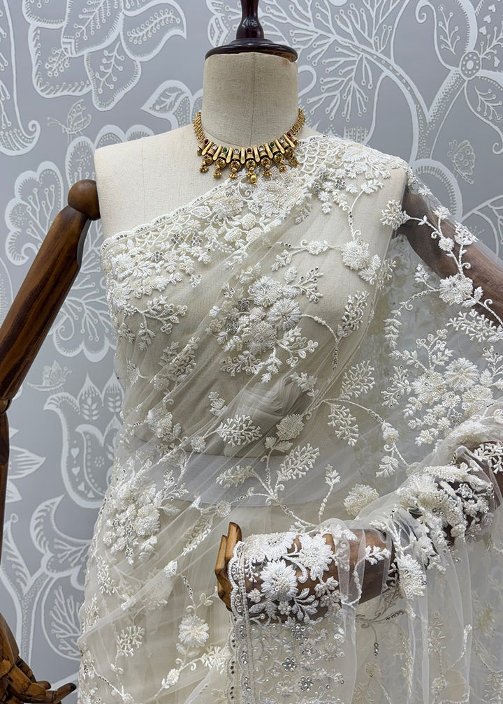 Buy Now Cream Elegant Floral Thread Embroidery Indian Wedding Saree Online in US, UK, Canada, France, Germany, Denmark, Sweden, Austria &amp; Worldwide at Empress.