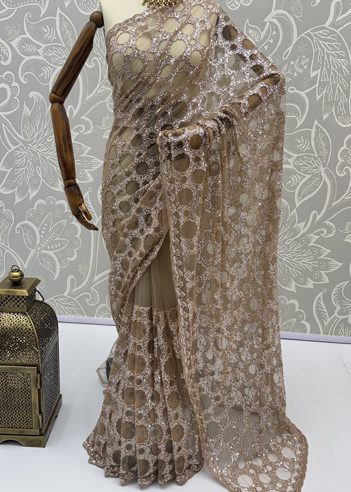 Buy Now Champagne Beige Net Saree with Cutwork &amp; Sequin Embroidery Online in US, UK, Canada, France, Germany, Denmark, Sweden, Austria &amp; Worldwide at Empress.