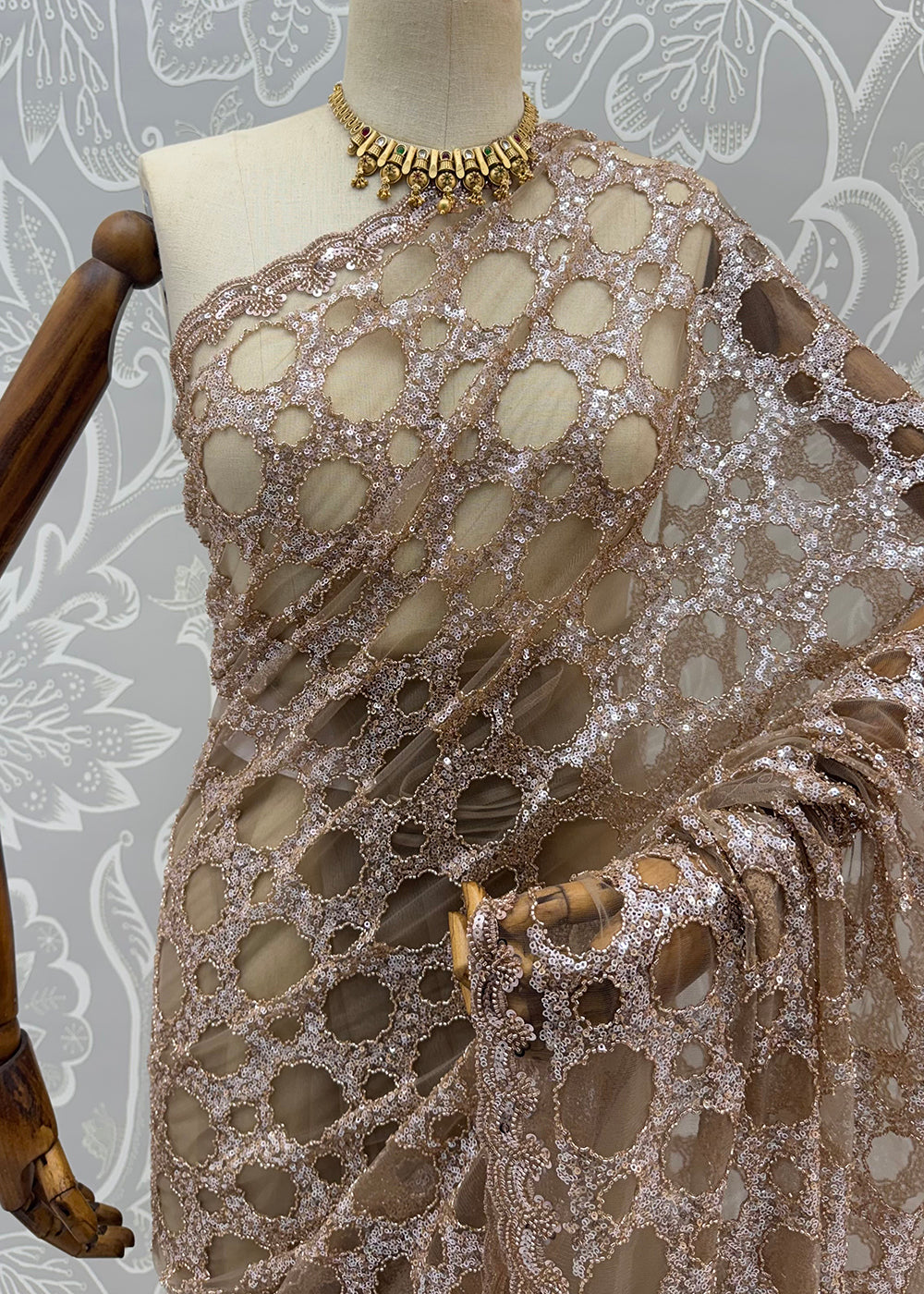 Buy Now Champagne Beige Net Saree with Cutwork &amp; Sequin Embroidery Online in US, UK, Canada, France, Germany, Denmark, Sweden, Austria &amp; Worldwide at Empress.