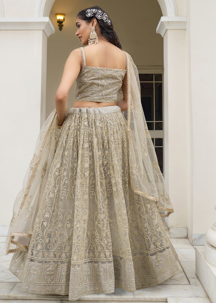 Buy Now Dusty Ivory Net Embroidered Wedding Lehenga Choli Online in USA, UK, Canada & Worldwide at Empress Clothing.