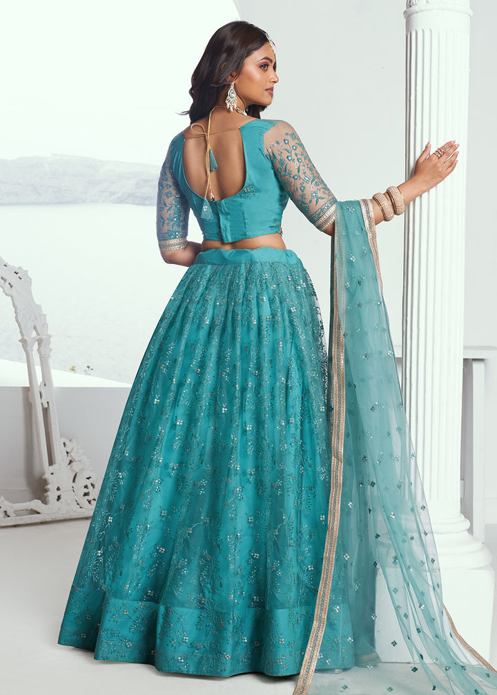 Buy Now Rama Green Net Embroidered Wedding Festive Lehenga Choli Online in USA, UK, Canada & Worldwide at Empress Clothing. 