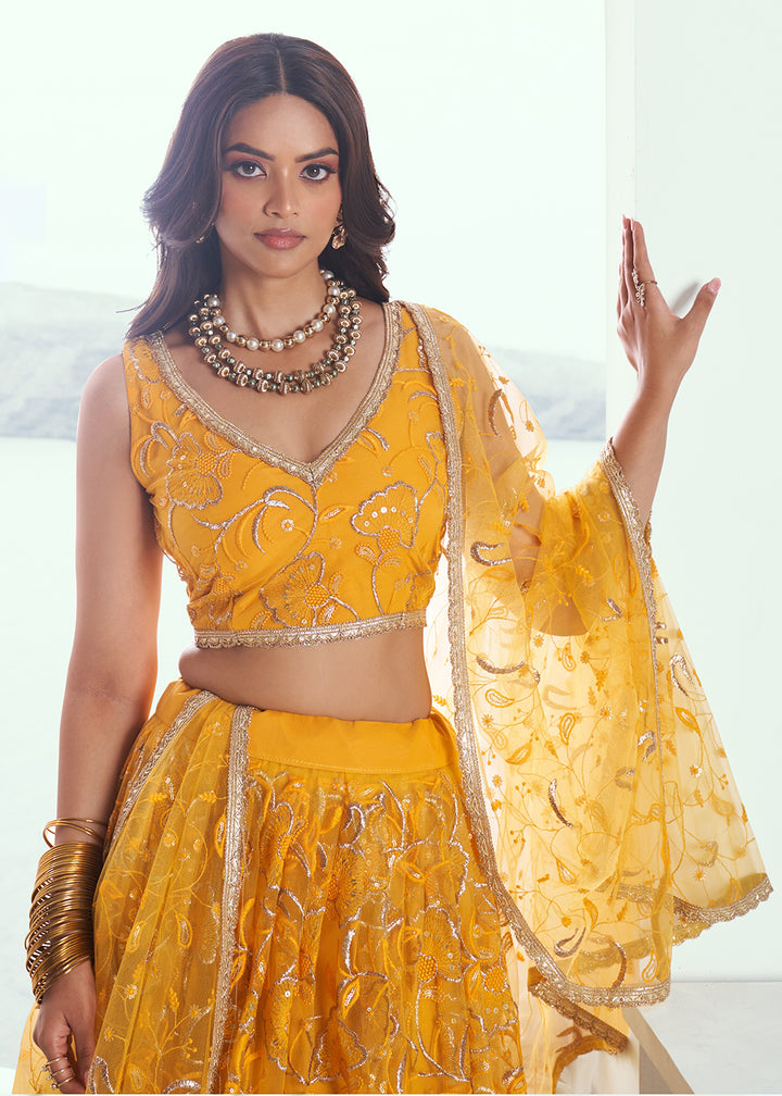 Buy Now Yellow Net Embroidered Wedding Festive Lehenga Choli Online in USA, UK, Canada & Worldwide at Empress Clothing.