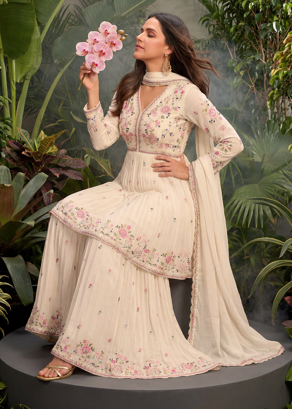 Buy Now Cream Tunic Style Embroidered Palazzo Style Suit Online in US, UK, Canada, Netherlands, Germany, Italy, France, Greece, UAE & Worldwide at Empress.