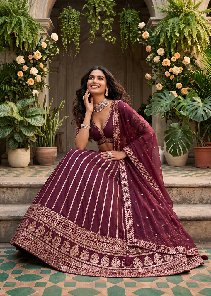 Buy Now Wine Premium Silk Embroidered Festive Lehenga Choli Online in US, UK, Canada, France, Italy, Germany, Sweden, UAE, Switzerland &amp; Worldwide at Empress.