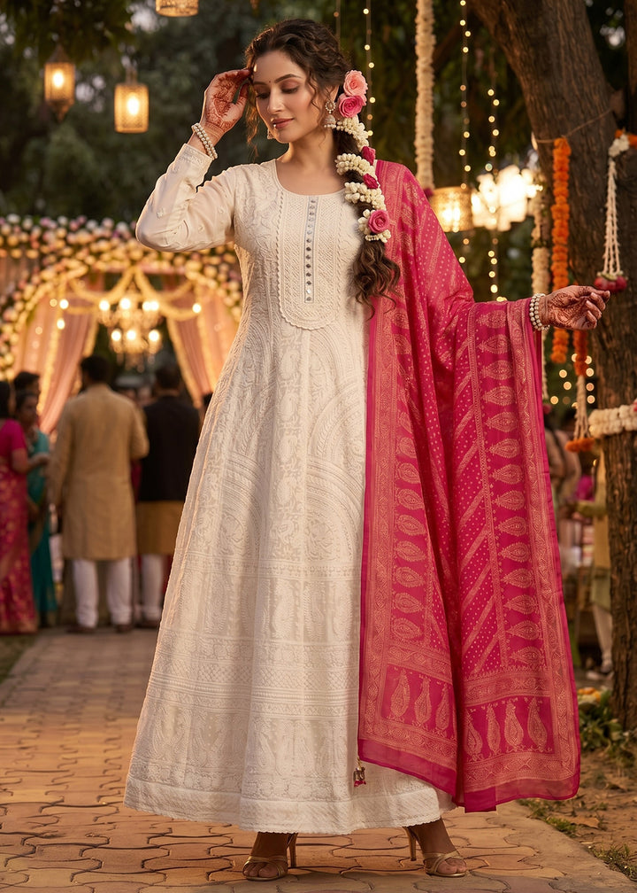 Buy NowOff White Beautiful Chikankari Embroidered Anarkali Gown Online in US, UK, Canada, France, Italy, Sweden, Ireland, Denmark, UAE & Worldwide at Empress.