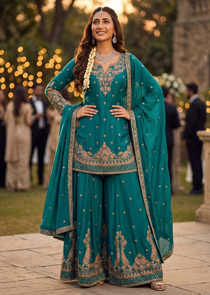 Shop Now Sea Green Heavy Beads Embroidered Silk Gharara Suit Online at Empress in USA, UK, Canada, Italy, Germany, France, Greece, Sweden, UAE & Worldwide.