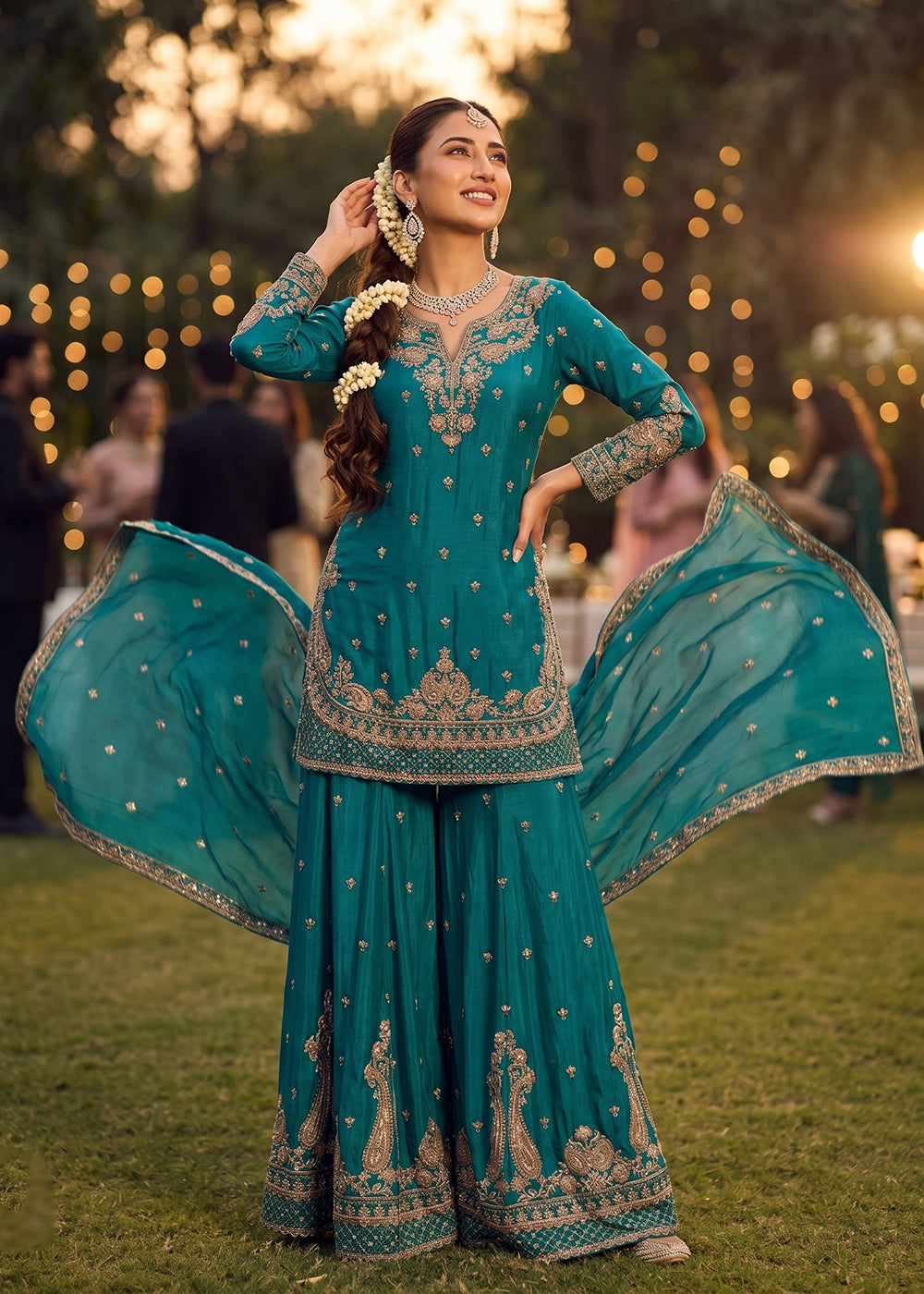 Shop Now Sea Green Heavy Beads Embroidered Silk Gharara Suit Online at Empress in USA, UK, Canada, Italy, Germany, France, Greece, Sweden, UAE & Worldwide.