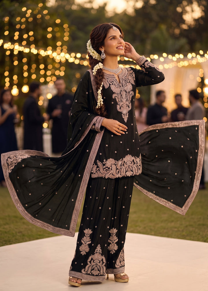 Shop Now Black Heavy Beads Embroidered Silk Gharara Suit Online at Empress in USA, UK, Canada, Italy, Germany, France, Greece, Sweden, UAE & Worldwide.