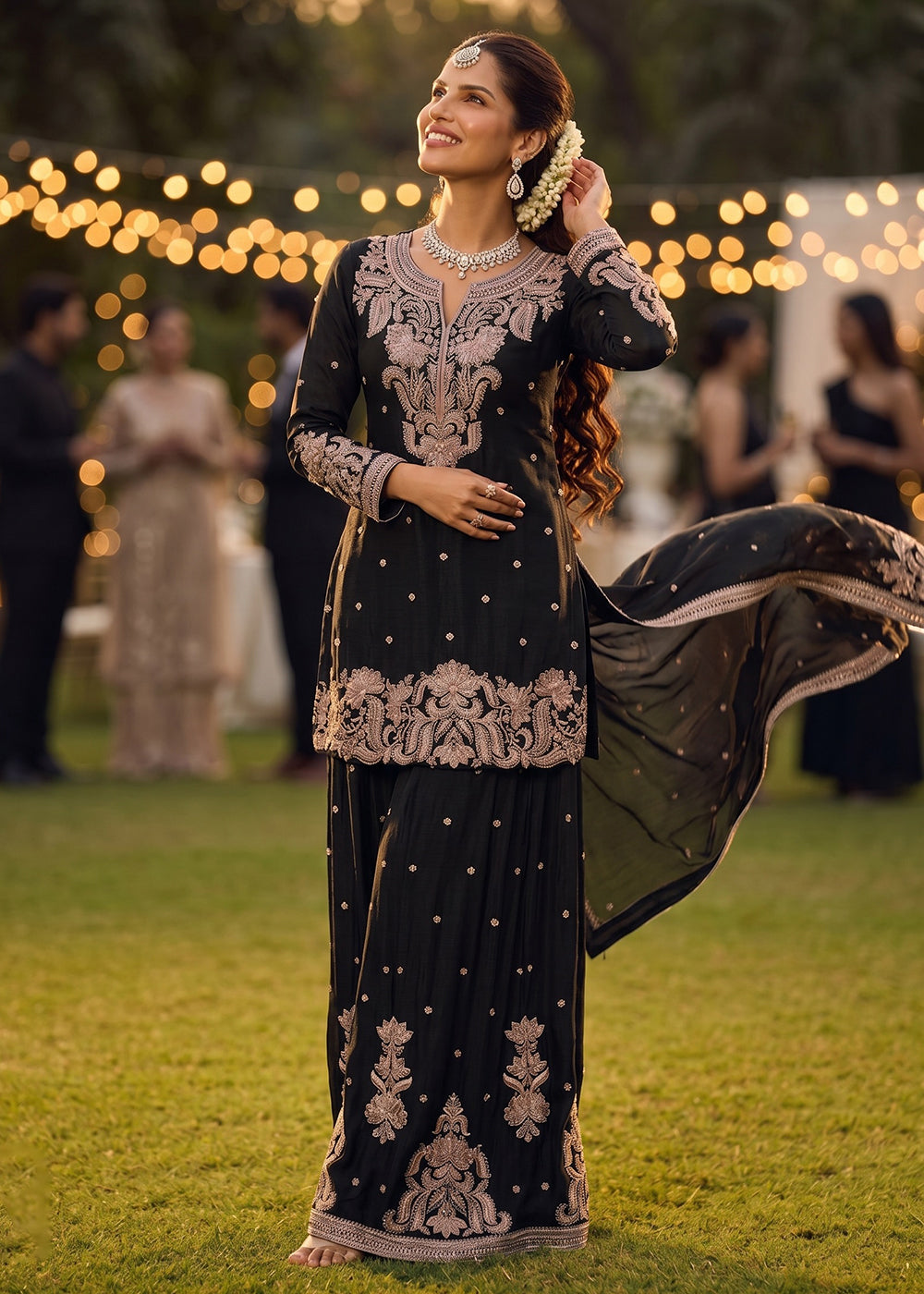 Shop Now Black Heavy Beads Embroidered Silk Gharara Suit Online at Empress in USA, UK, Canada, Italy, Germany, France, Greece, Sweden, UAE & Worldwide.