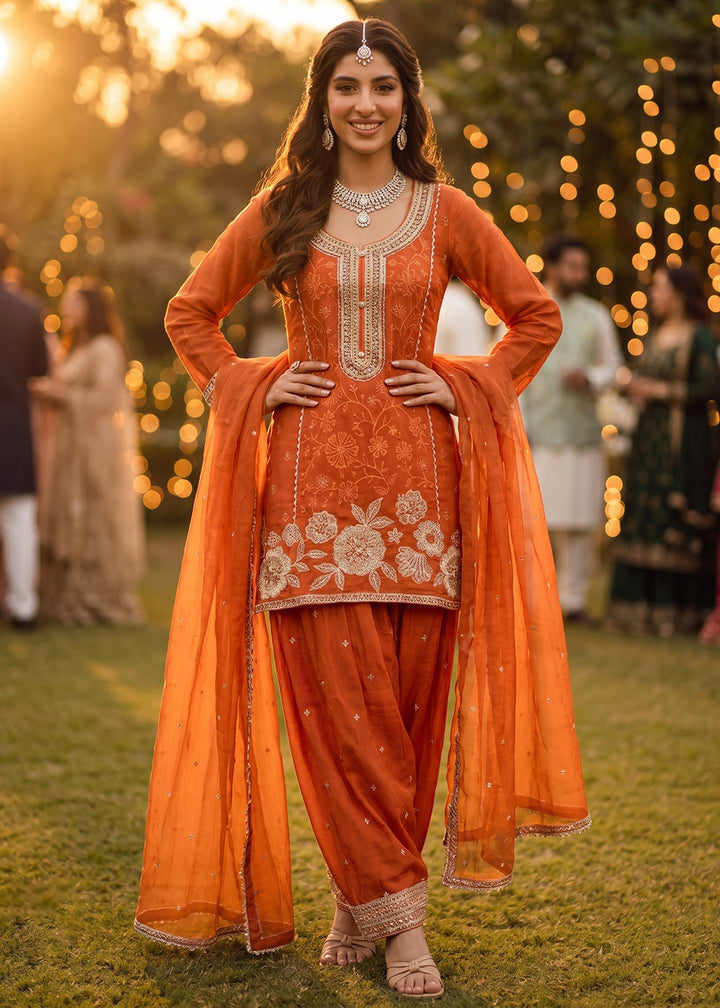 Buy Now Orange Heavy Beads Embroidered Silk Salwar Suit Online in US, UK, Canada, Netherlands, Germany, Italy, France, Sweden, Denmark & Worldwide at Empress.
