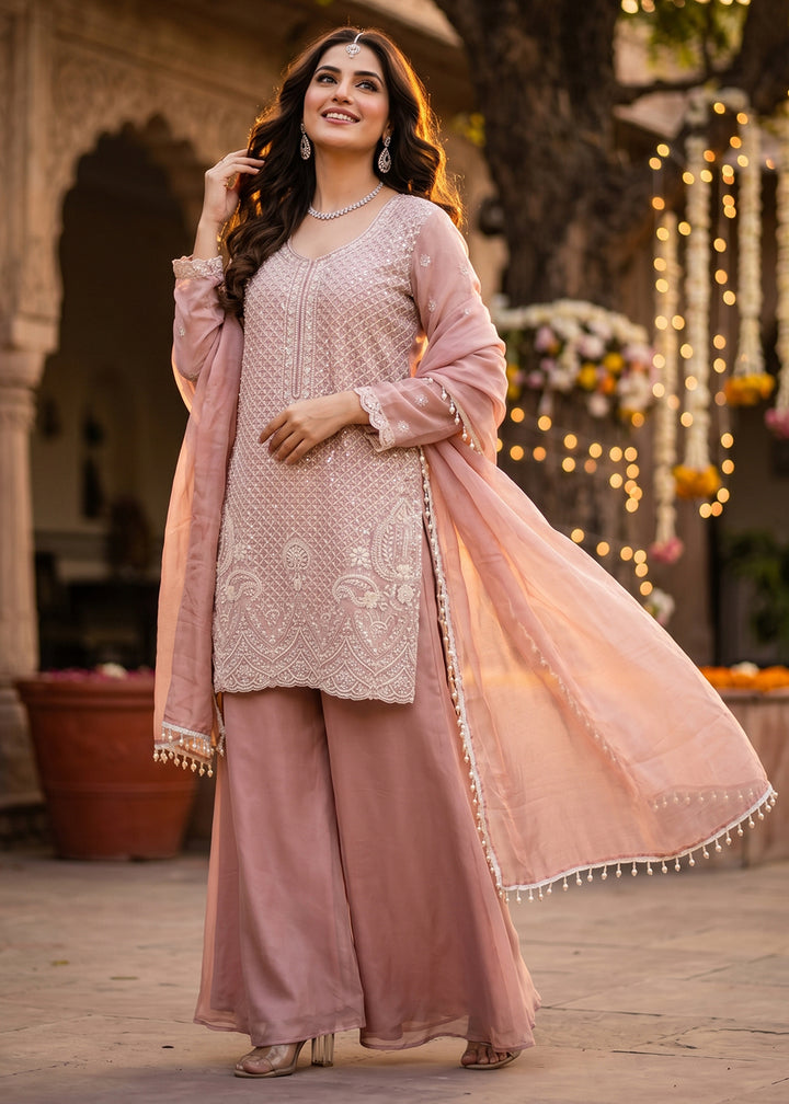 Buy Now Blush Pink Beads & Sequins Embroidered Palazzo Style Suit Online in US, UK, Canada, Netherlands, Germany, Italy, France, Sweden & Worldwide at Empress.