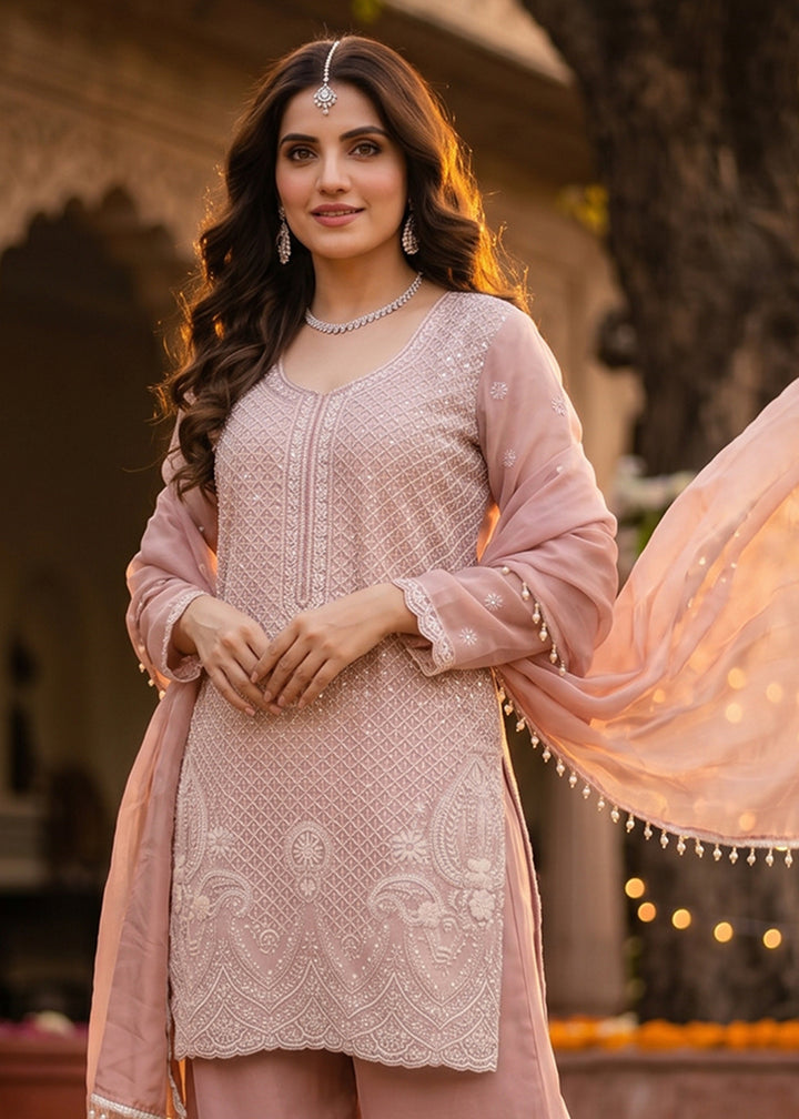 Buy Now Blush Pink Beads & Sequins Embroidered Palazzo Style Suit Online in US, UK, Canada, Netherlands, Germany, Italy, France, Sweden & Worldwide at Empress.