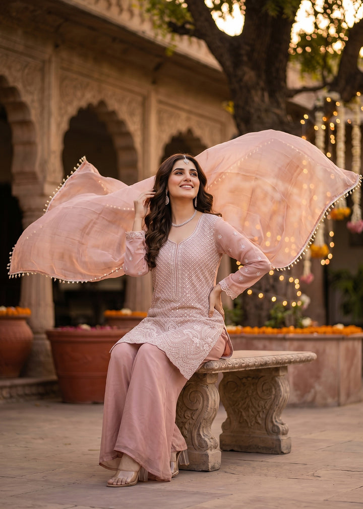 Buy Now Blush Pink Beads & Sequins Embroidered Palazzo Style Suit Online in US, UK, Canada, Netherlands, Germany, Italy, France, Sweden & Worldwide at Empress.