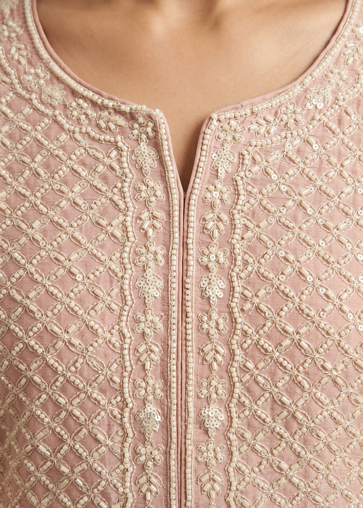 Buy Now Blush Pink Beads & Sequins Embroidered Palazzo Style Suit Online in US, UK, Canada, Netherlands, Germany, Italy, France, Sweden & Worldwide at Empress.