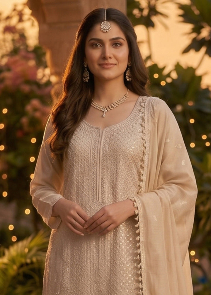 Buy Now Beige Beads & Sequins Embroidered Palazzo Style Suit Online in US, UK, Canada, Netherlands, Germany, Italy, France, Sweden, UAE & Worldwide at Empress.