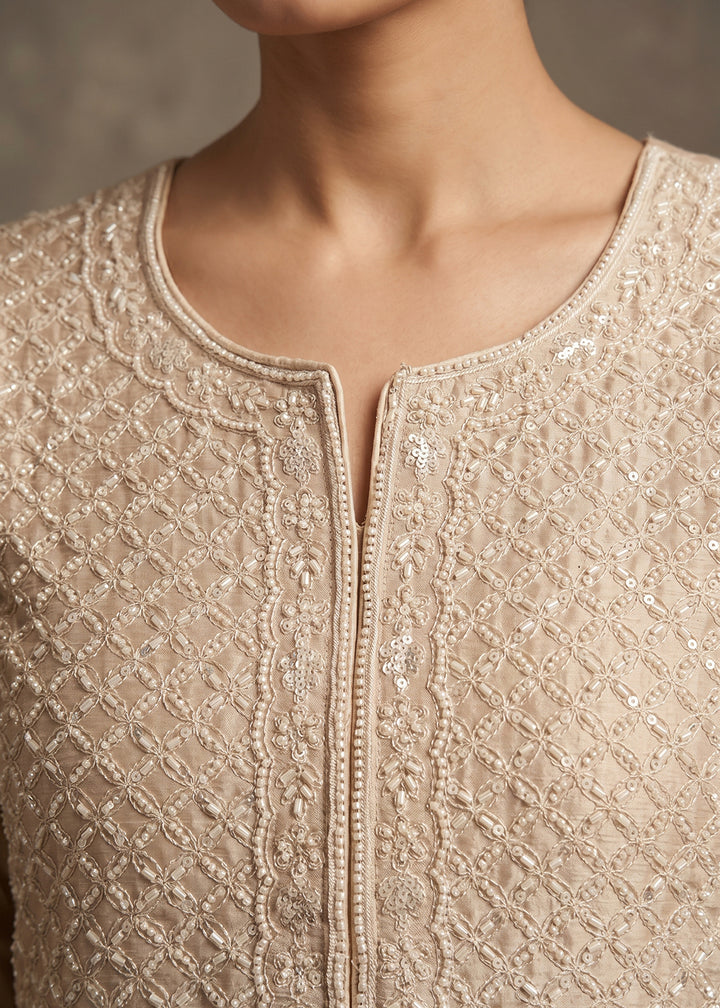 Buy Now Beige Beads & Sequins Embroidered Palazzo Style Suit Online in US, UK, Canada, Netherlands, Germany, Italy, France, Sweden, UAE & Worldwide at Empress.