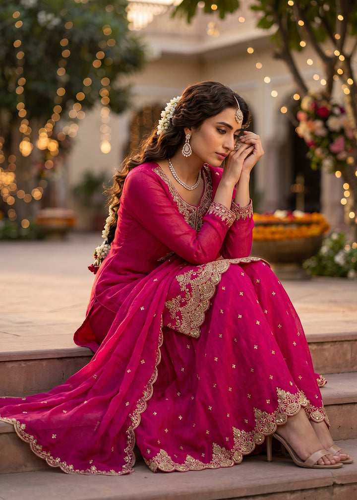 Buy Now Rani Pink Tora Silk Embroidered Festive Palazzo Style Dress Online in US, UK, Canada, Netherlands, Germany, Italy, France, UAE & Worldwide at Empress.