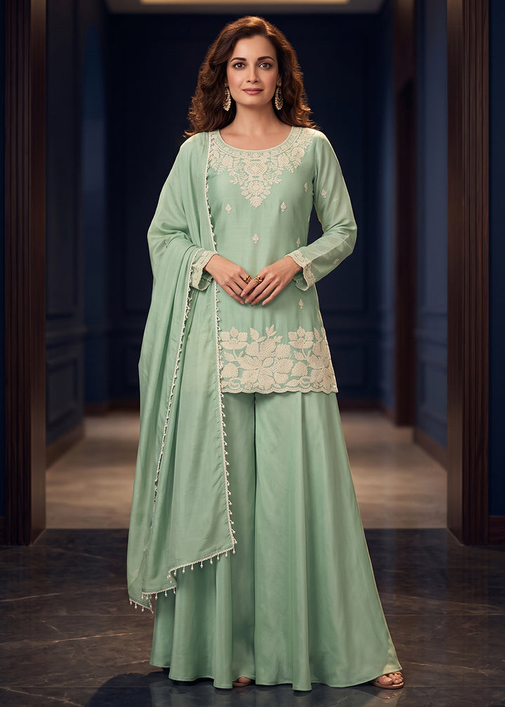 Shop Now Green Premium Chinnon Beads Work Sharara Suit Online at Empress in US, UK, Canada, Italy, Germany, France, Greece, Sweden, UAE, Denmark &amp; Worldwide.