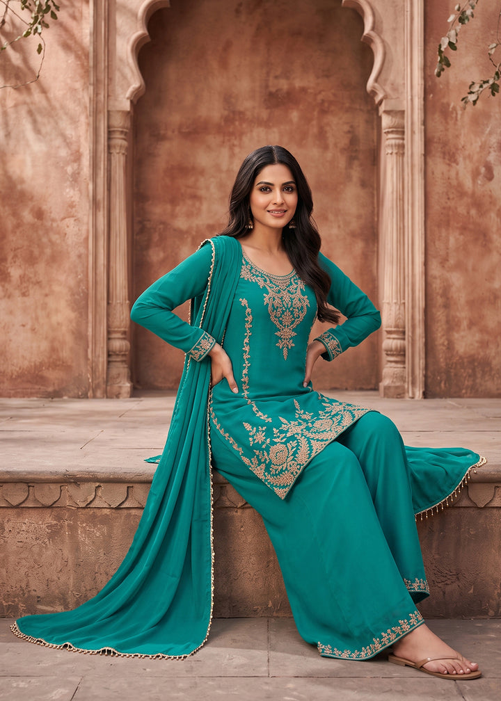 Buy Now Turquoise Embroidery Work Festive Wear Palazzo Dress Online in US, UK, Canada, Germany, Italy, France, Greece, Austria, Denmark &amp; Worldwide at Empress.