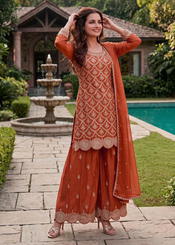 Buy Now Lovely Rust Premium Chinnon Palazzo Style Suit Online in US, UK, Canada, Netherlands, Germany, Italy, France, Greece, UAE &amp; Worldwide at Empress.