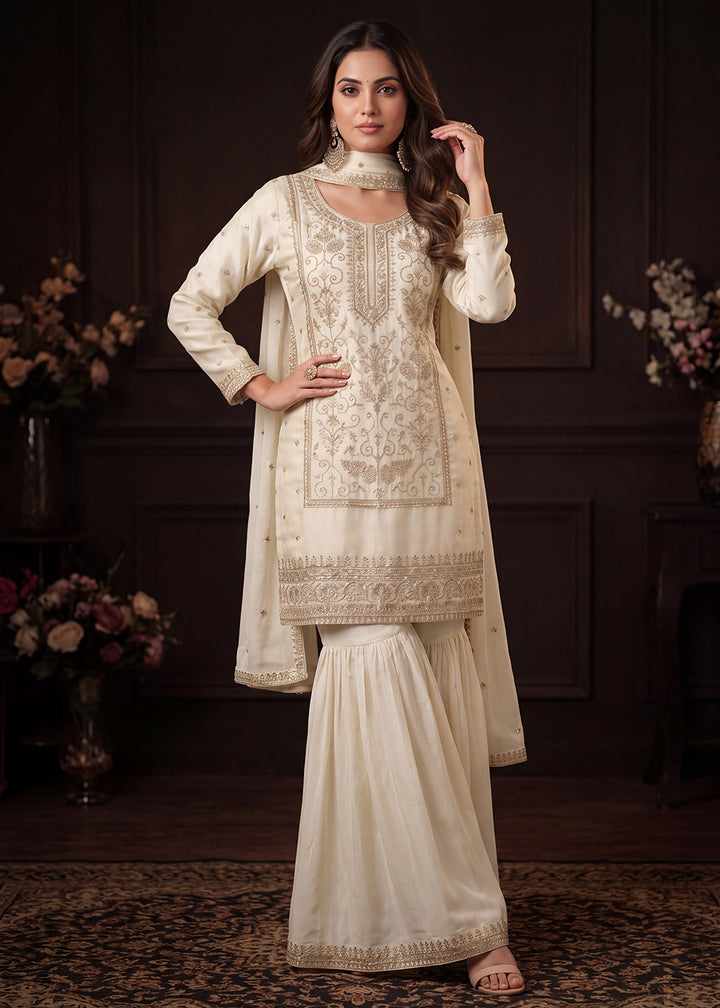 Shop Now Off White Satin Silk Embroidered Gharara Style Dress Online at Empress in US, UK, Canada, Italy, Germany, France, Greece, Sweden, Denmark &amp; Worldwide.