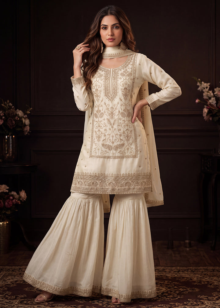 Shop Now Off White Satin Silk Embroidered Gharara Style Dress Online at Empress in US, UK, Canada, Italy, Germany, France, Greece, Sweden, Denmark &amp; Worldwide.
