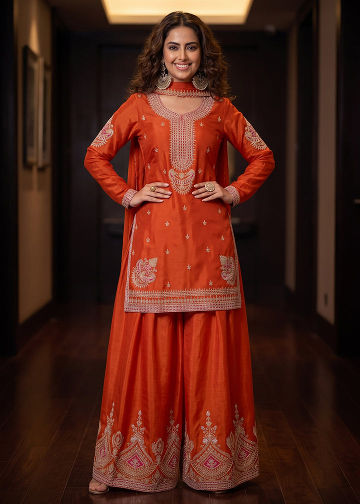 Buy Now Awesome Orange Chinnon Silk Festive Style Palazzo Suit Online in US, UK, Canada, Netherlands, Germany, Italy, France, Greece, UAE &amp; Worldwide at Empress
