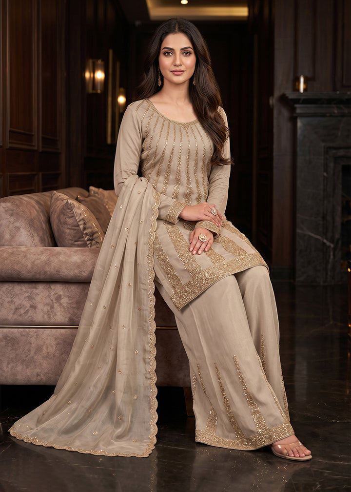 Buy Now Superb Beige Premium Silk with Beads Palazzo Style Suit Online in US, UK, Canada, Netherlands, Germany, Italy, France, Greece &amp; Worldwide at Empress.