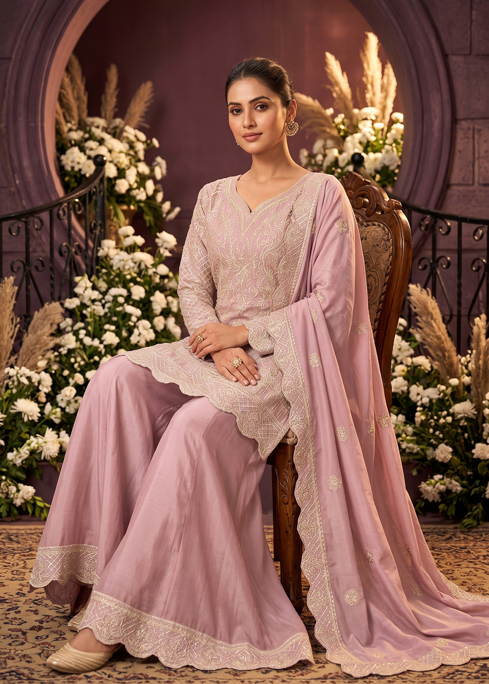 Shop Now Premium Chinnon Pink Ribbon Embroidered Gharara Suit Online at Empress in US, UK, Canada, Italy, Germany, France, Greece, Sweden, Denmark &amp; Worldwide.