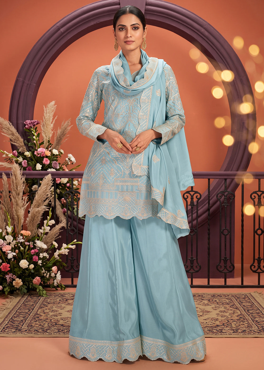 Shop Now Premium Chinnon Blue Ribbon Embroidered Gharara Suit Online at Empress in US, UK, Canada, Italy, Germany, France, Greece, Sweden, Denmark & Worldwide.