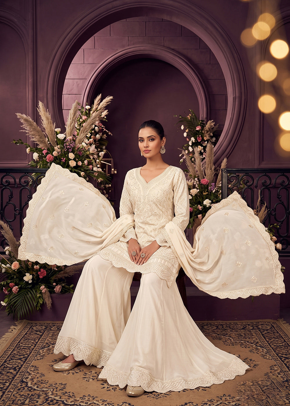 Shop Now Premium Chinnon Off White Ribbon Embroidered Gharara Suit Online at Empress in US, UK, Canada, Italy, Germany, France, Greece, Sweden, UAE &amp; Worldwide.
